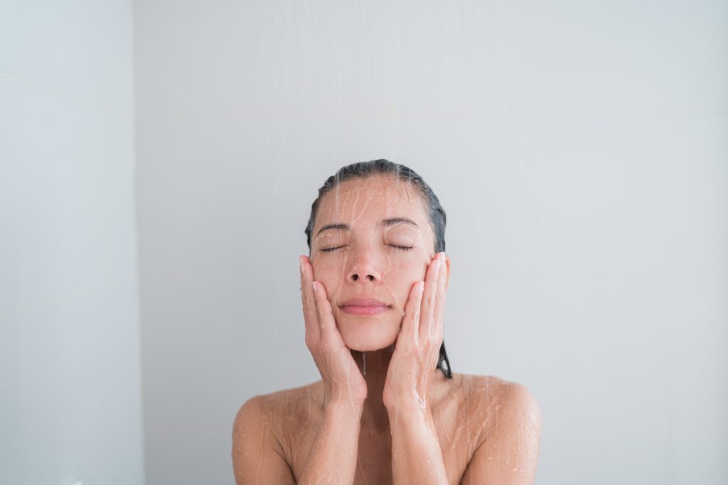 Woman washing face