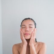 Woman washing face