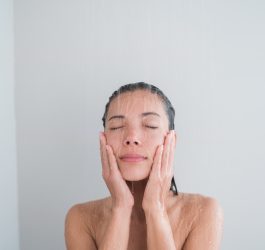 Woman washing face